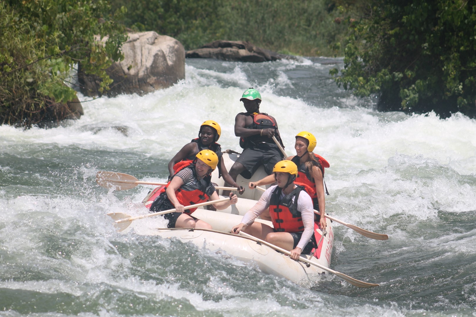 Whitewater spray over a raft on the White Nile in Uganda