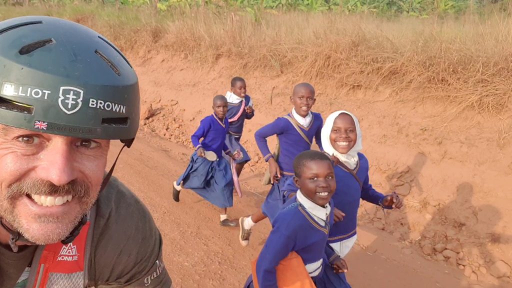 Real Uganda – kids waving, fishermen smiling, pure joy at kiira rafting